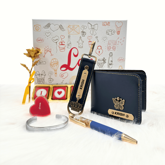 A customized royal blue leather wallet, royal blue keychain, gold flaked pen, metal kada, scented candle with a gold plated rose, enclosed in a white box, perfect for valentines gifting.