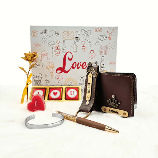 A customized brown leather wallet, brown keychain, gold flaked pen, metal kada, scented candle with a gold plated rose, enclosed in a white box, perfect for valentines gifting.
