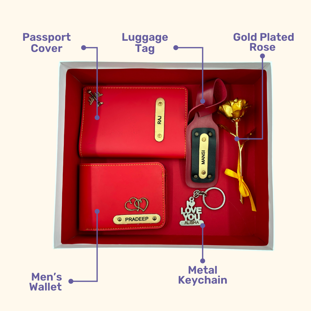 A top view of a box containing customized wine colored leather wallet, passport cover, luggage tag, I Love You keychain, and gold plated rose.