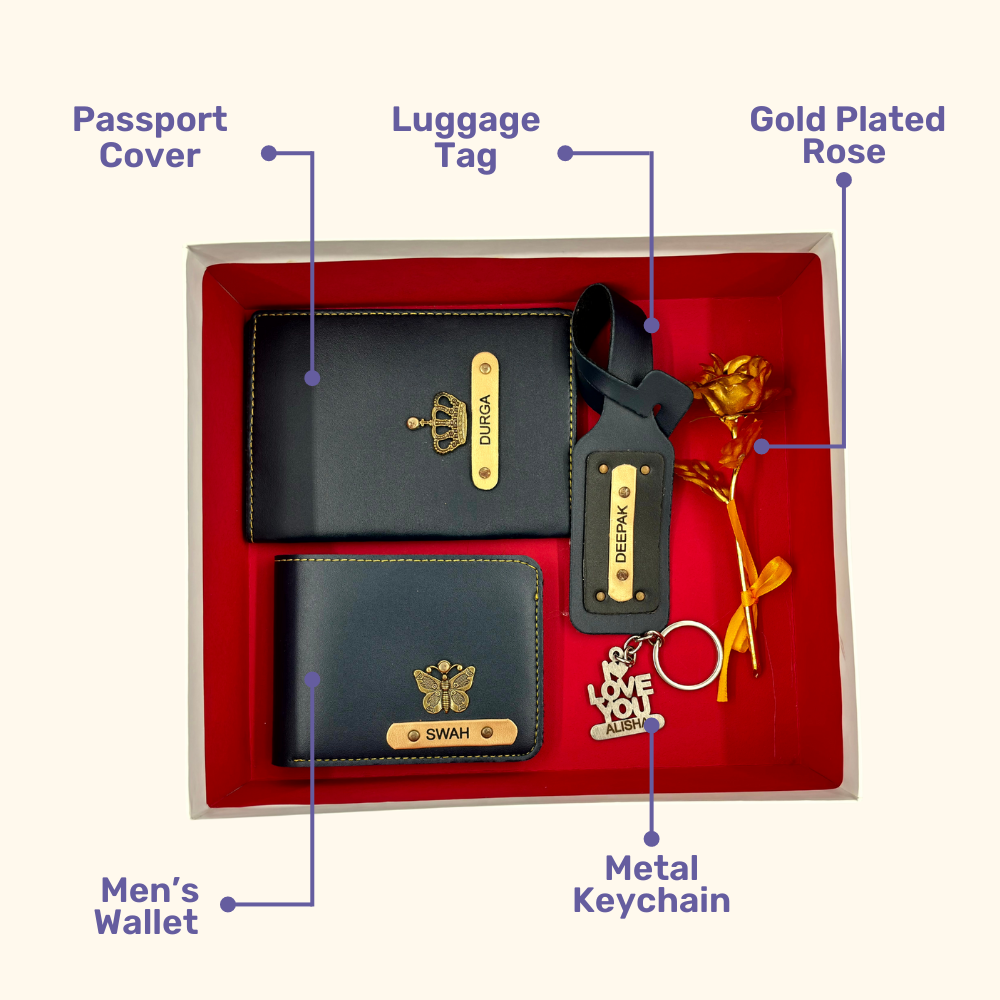 A top view of a box containing customized royal blue leather wallet, passport cover, luggage tag, I Love You keychain, and gold plated rose.