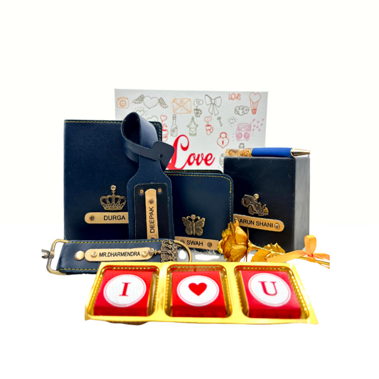A customized royal blue leather wallet, passport cover, luggage tag, I Love You chocolate, along with a gold rose, keychain and a leather box enclosed in a white box, perfect for valentines gifting.