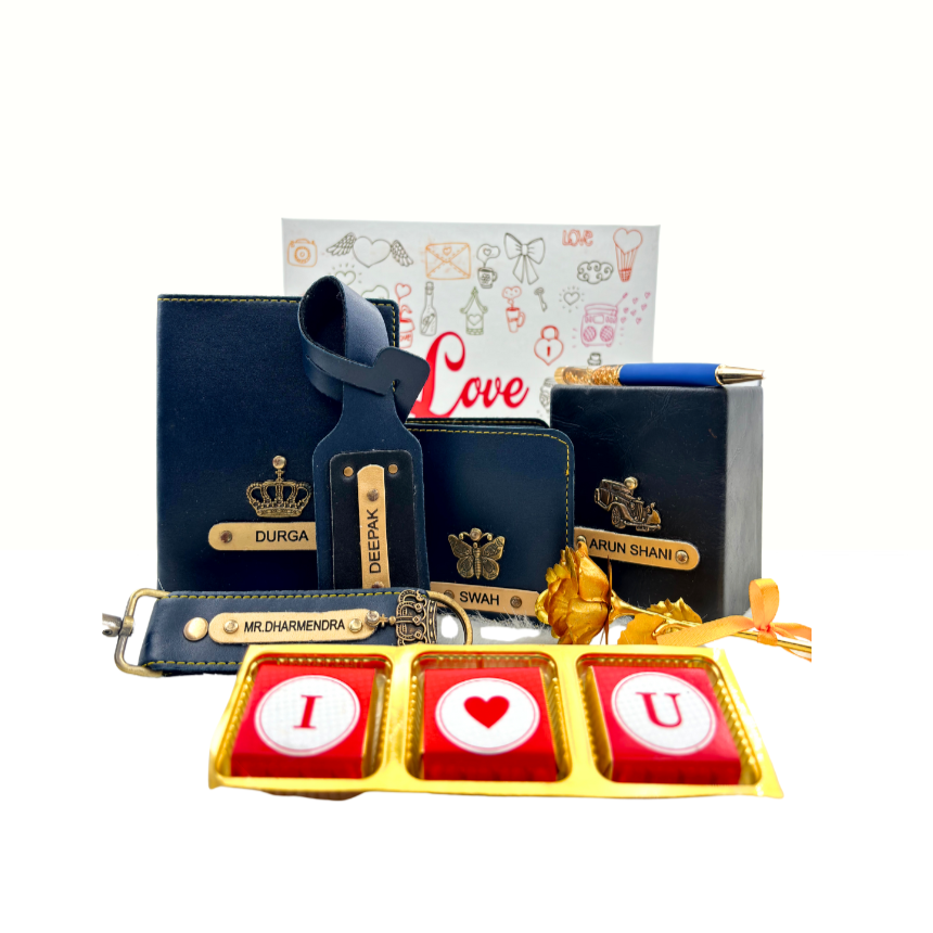 A top view of a box containing customized leather wallet, passport cover, luggage tag, I Love You chocolate, along with a gold rose, keychain and a leather box