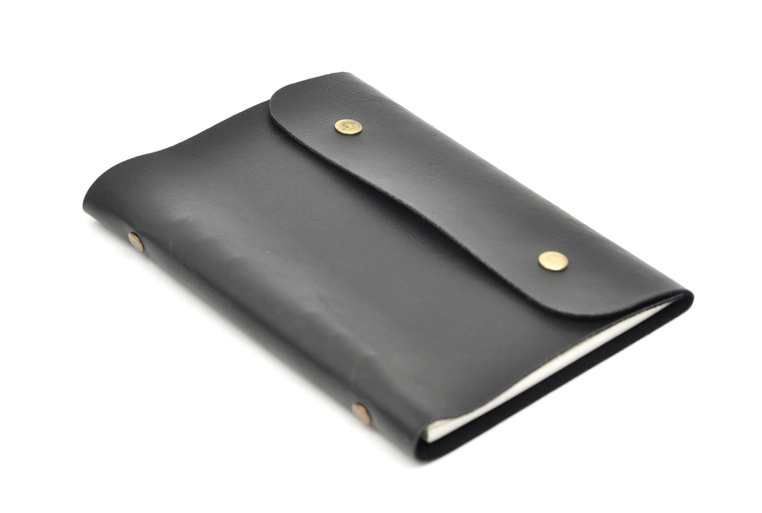 Keep your thoughts organized in style with our customized leather buttoned diary. Perfect for any occasion, our elegant designs are sure to impress.