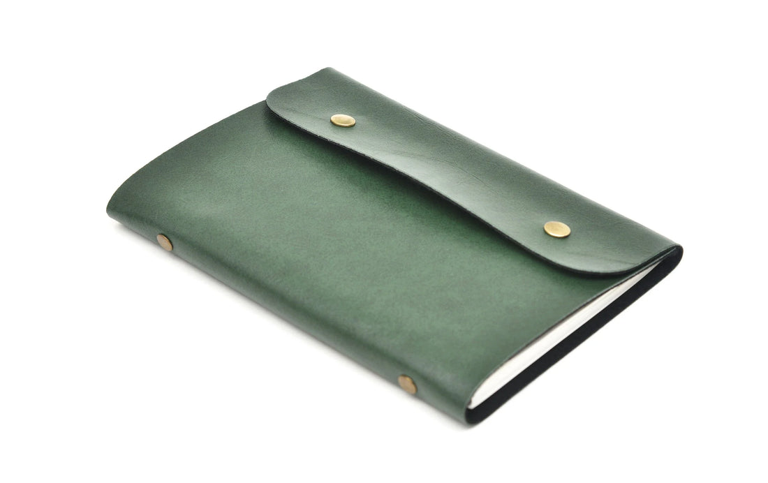 Our custom leather buttoned diaries are the perfect way to keep your schedule and notes organized. With a range of designs to choose from, you can find the one that suits your style.