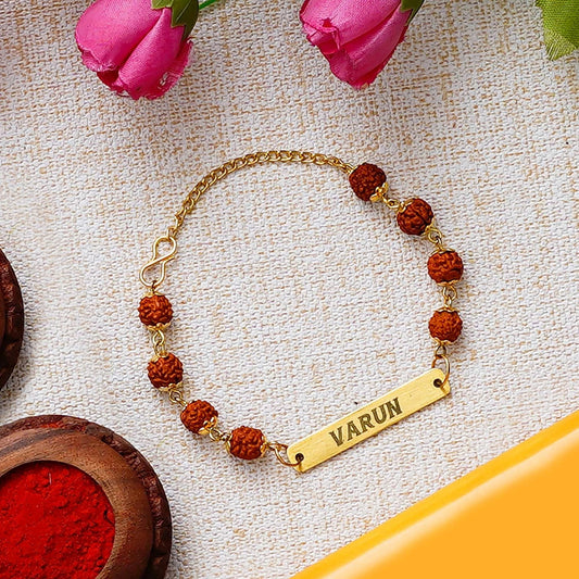 (Pack of 2 )Rudraksha Rakhi Bracelet Customised with Name - YOUR GIFT STUDIO. Frontview of our stylish,classy and affordable rakhis Gift your brother a personalised rakhi with a polaroid photo.
