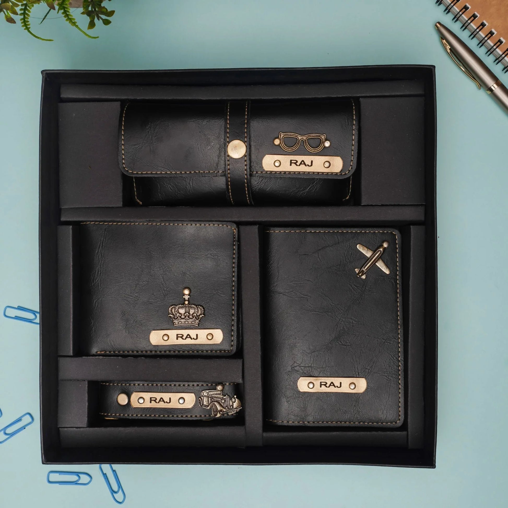 Make a style statement with our customized men's combo! This carefully curated set includes a leather wallet, passport case, sunglasses case and keychain, both of which can be personalized with your choice of initials, monogram or design.