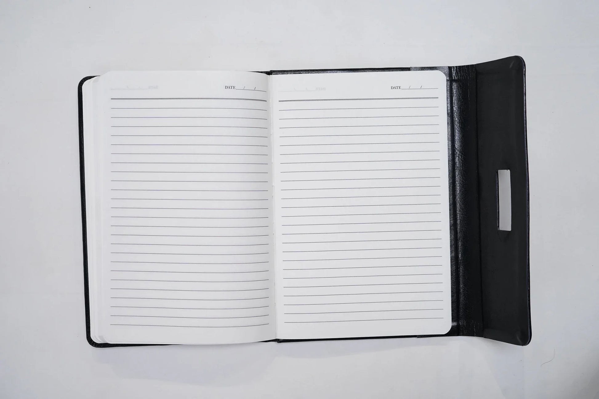 Keep your thoughts, ideas, and memories organized with our premium quality diary. This diary is bound in soft, supple leather and features smooth, unlined pages, perfect for jotting down your musings and reflections.Inside or open view of diary