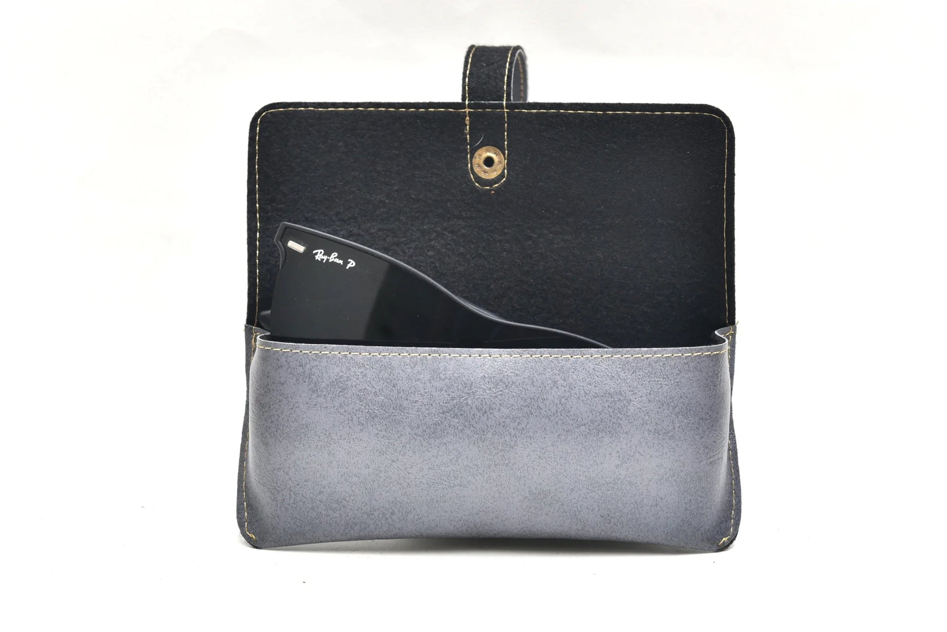 Inside or open view of grey sunglasses case