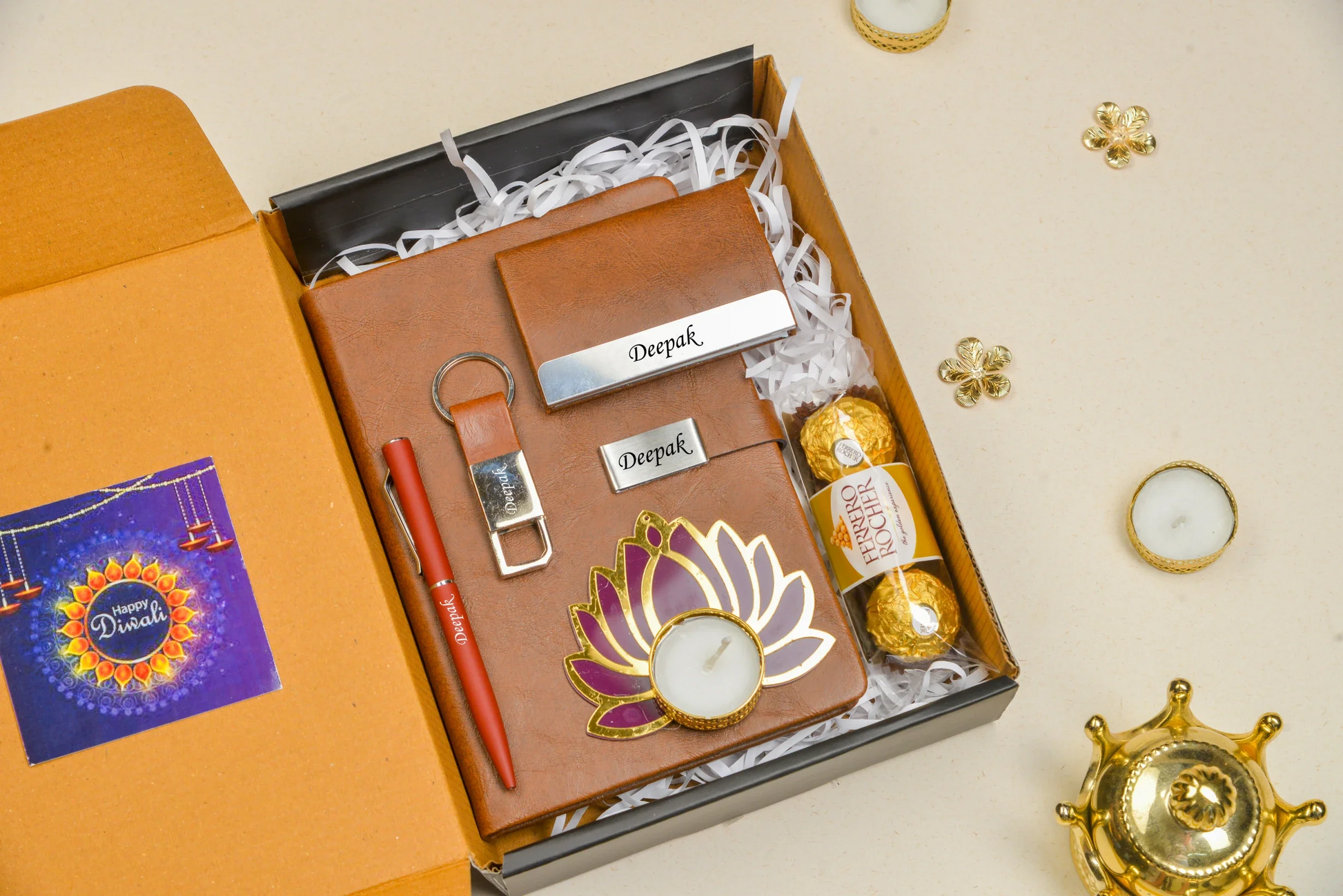 Celebrate the festive season with our Diwali Combo! This set features a stylish diary, a useful keychain, a beautiful diya, delicious chocolates, a sleek pen, and a practical card holder. The perfect gift for friends and family!