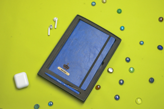 "Stay organized and on top of your game with our comprehensive corporate diary and pen set. A must-have for any professional."