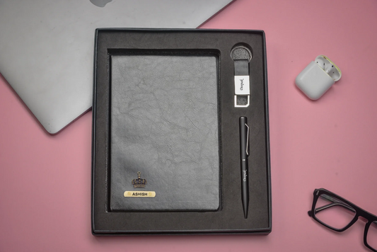 "Make a statement and elevate your brand image with our stylish corporate set. Our chic diary, bold pen, and eye-catching keychain will turn heads and leave a lasting impression."