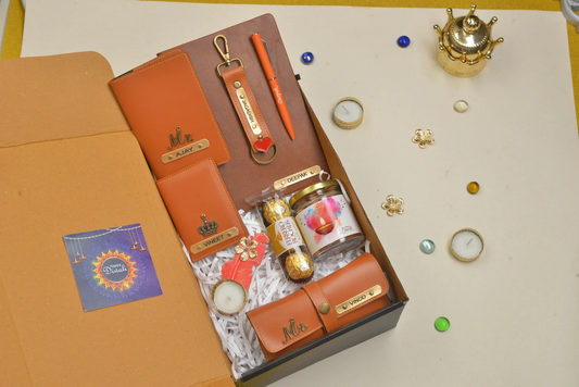Make this Diwali one to remember by gifting your loved ones our deluxe Diwali combo set. With a hardcover diary, faux leather keychain, passport cover, eyewear, wallet, chocolates, diya, dryfruit jar, and pen, this gift set is sure to be a hit with anyone who receives it.