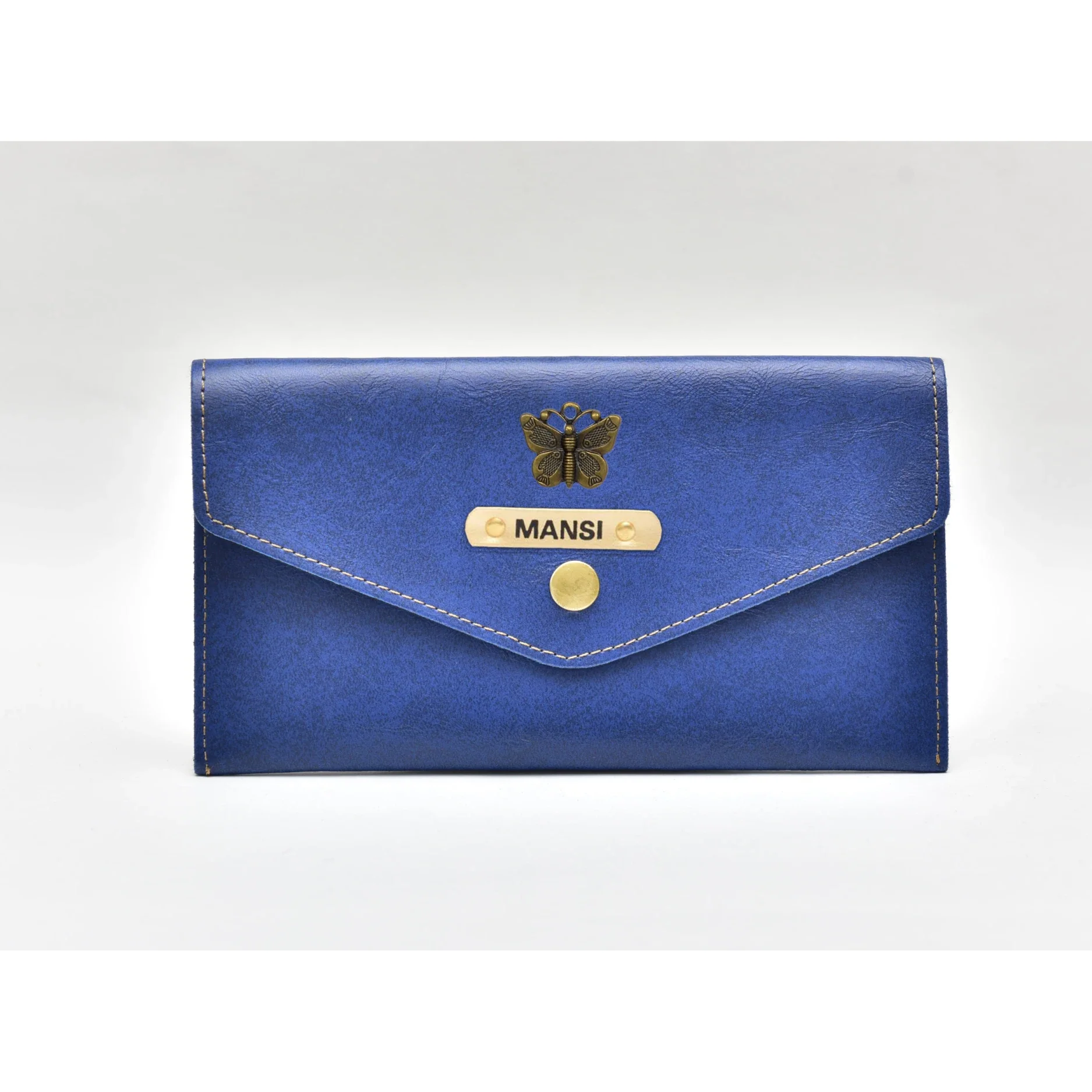 Make a statement with this personalized leather clutch, featuring a unique design of your choice. Perfect for a night out or special occasion.
