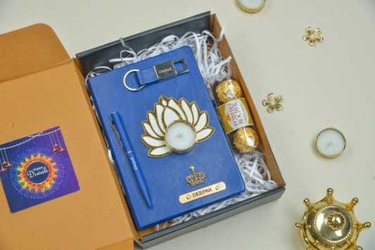 Impress your loved ones this Diwali with our customizable Diwali combo. This set includes a premium quality diary, a beautifully crafted keychain, a traditional diya to spread light and joy, a selection of delicious chocolates, and a high-quality pen, all personalized with your unique message and design.