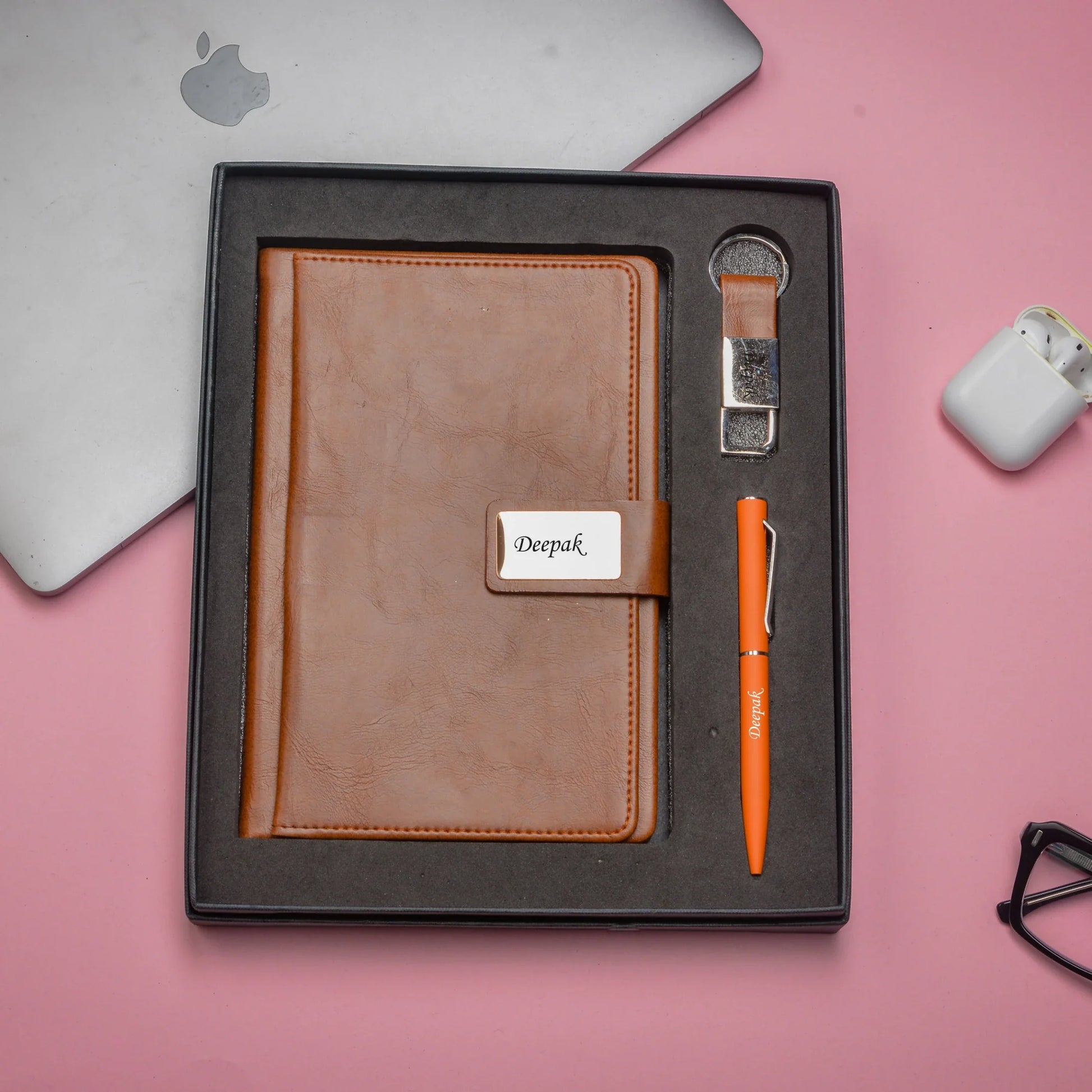"Get the job done with our durable and reliable corporate combo. Our tough diary, strong pen, and sturdy keychain will help you take on any challenge with confidence."
