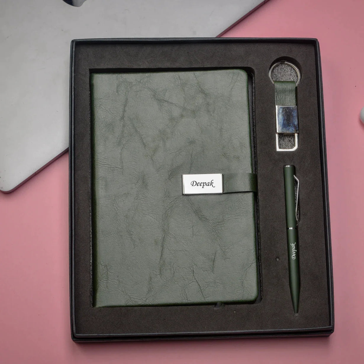 "Elevate your professional image with our sophisticated corporate set. Our elegant diary, smooth pen, and sleek keychain will give you a polished and professional look."
