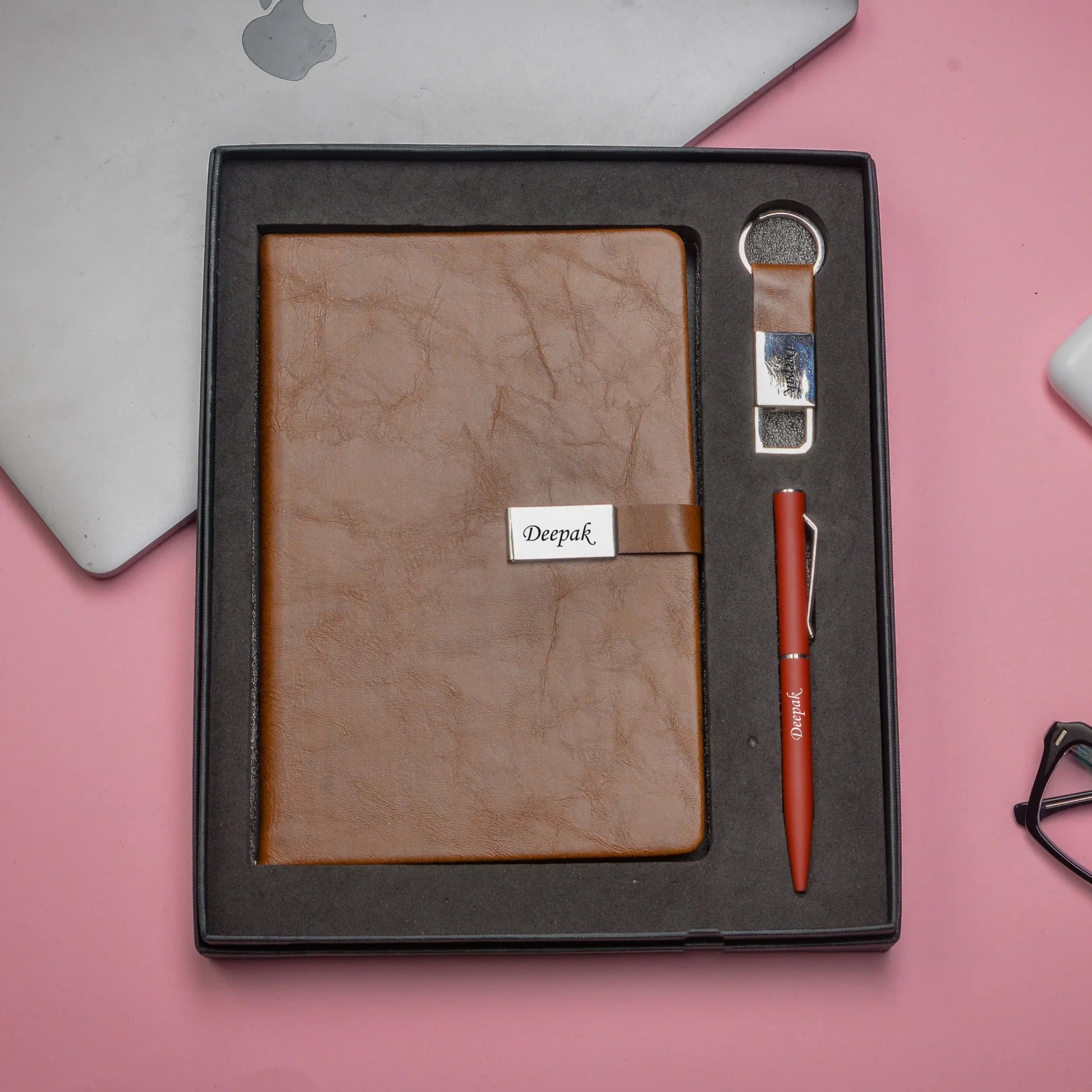 "Capture your thoughts, ideas, and memories with our comprehensive corporate set. Our versatile diary, smooth pen, and sturdy keychain will keep your life organized and on track."