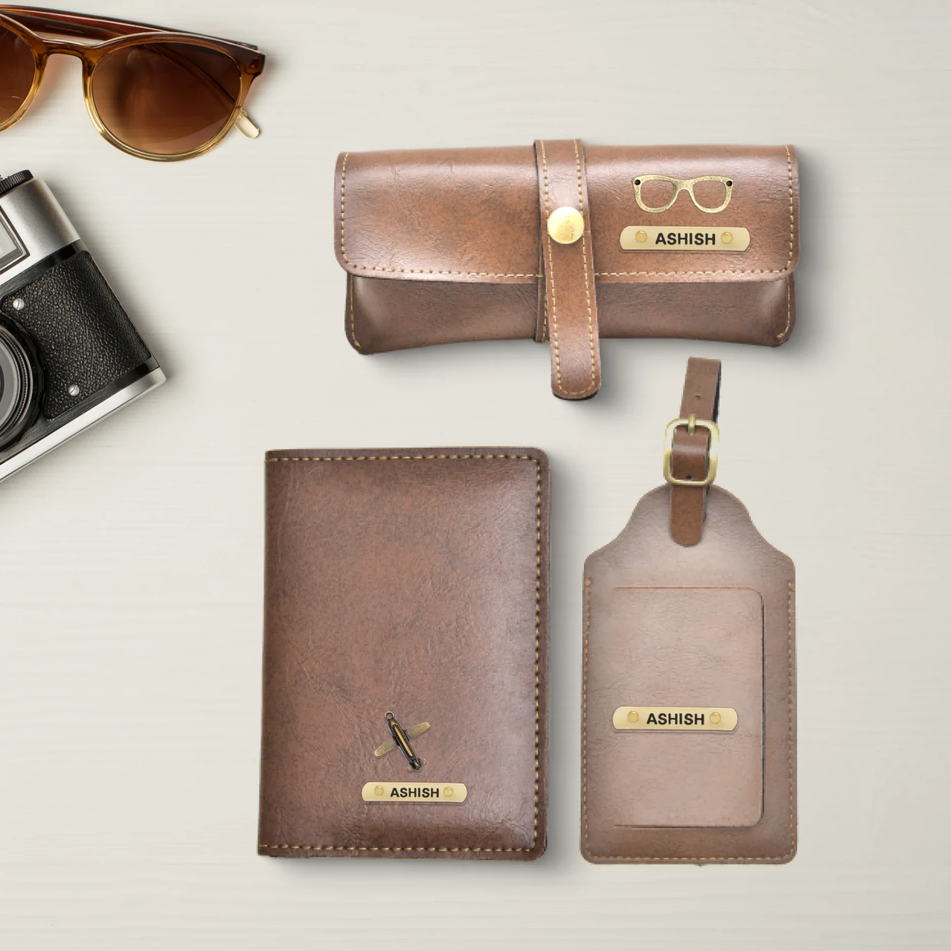 Available in a variety of colours, this combo comes with a Personalized Leather Passport Cover, Eyewear case and a luggage tag