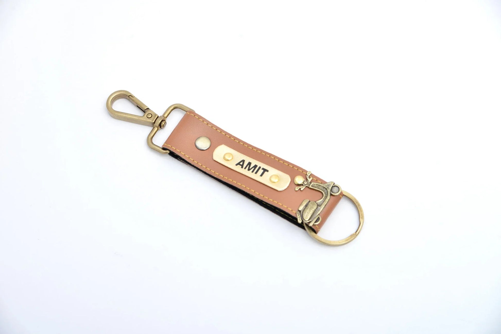 "  Make your keys stand out from the rest by adding your name and trinket on these Custom Keychains which come in your favourite colour! Ensure that your keys never get lost."