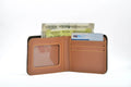 Inside or open view of tan mens wallet