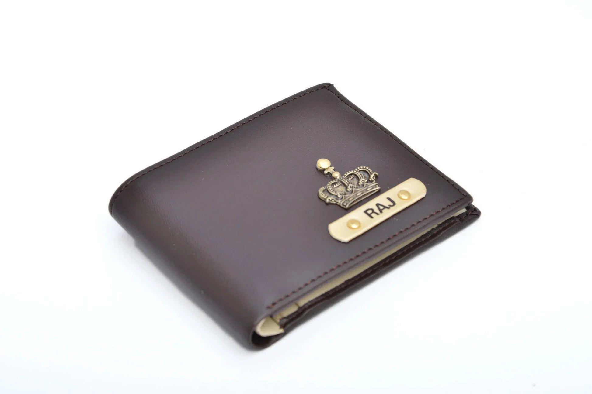 Keep your element of royalty in your wallet with our diverse range of customised and exclusive personalized men’s wallets at the best prices. 

The best part is that Faux leather is very durable. So, this men’s wallet can withstand scratches and scrapes that would mar genuine leather. It is not prone to crack or peel like leather. It will not fade as easily in ultraviolet light and is stain resistant.