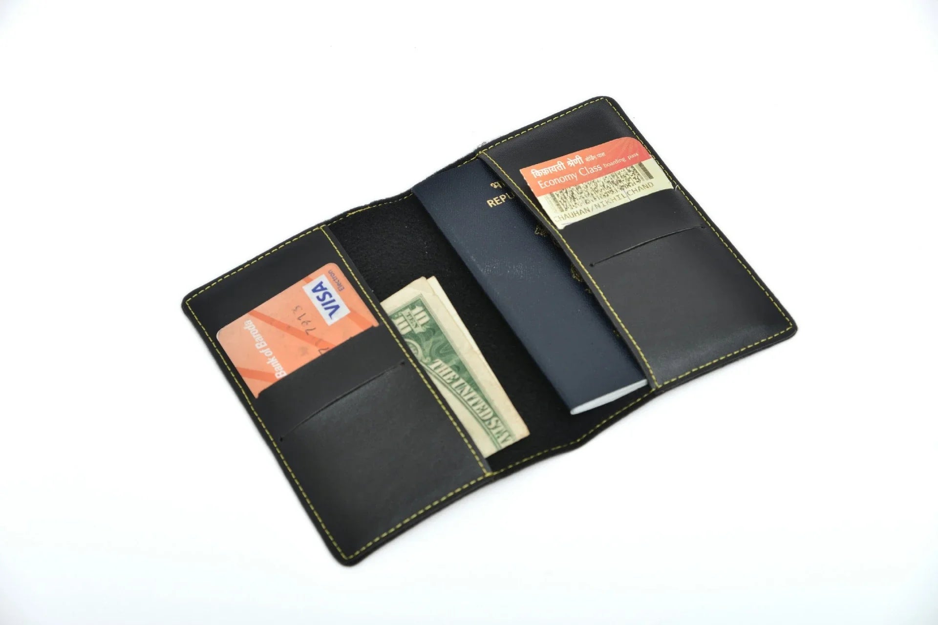 inside or open view of black passport case with a sturdy build and seamless finish