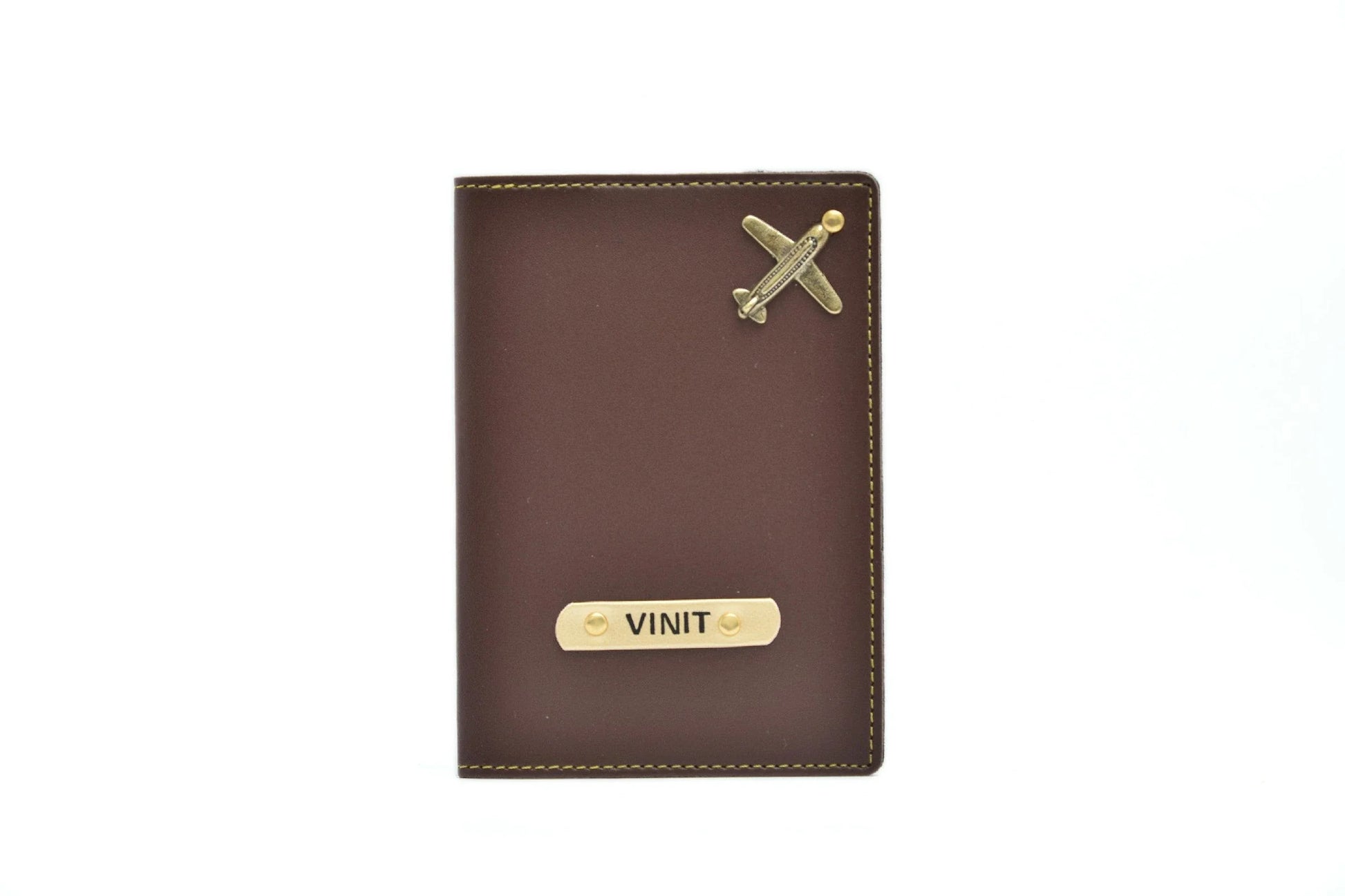 Get your name and favourite charm added to your favourite Premium Quality customized Faux Leather unisex Passport Cover!