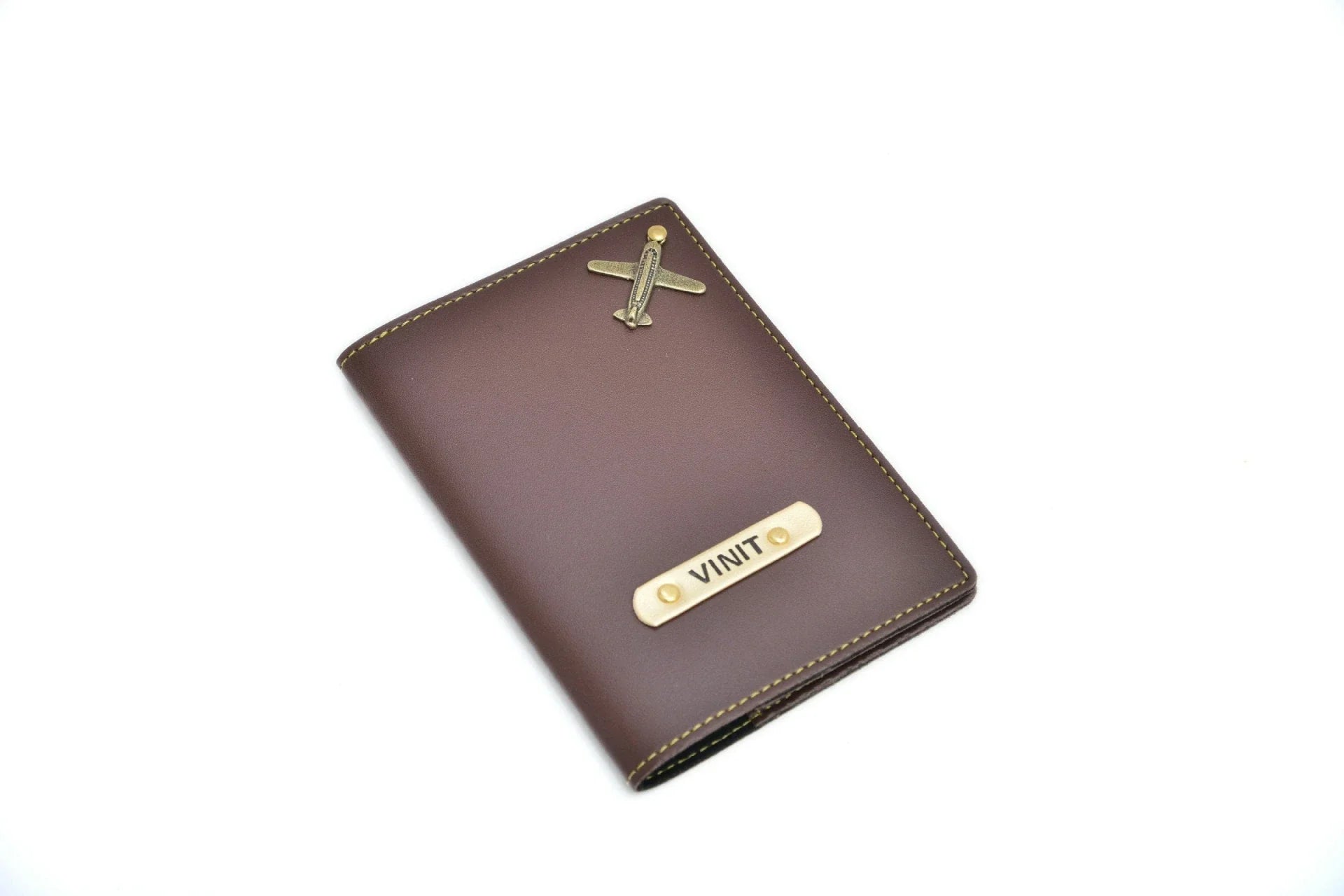 personalized-cb08-brown-customized-best-gift-for-boyfriend-girlfriend.A must-have travel accessory for today's minimalist traveler who seeks both style and function. With a personalized touch, it has your name and charm on it with its attractive finish.The case with its sturdy build ensures protection of your passport during traveling shenanigans! It carries your passport, money, cards etc. at one place. Material-vegan/synthetic leather