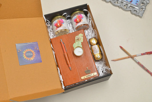 Celebrate Diwali with our ultimate combo! This set includes a stylish diary, a useful keychain, a beautiful diya, delicious chocolates, a sleek pen, and a handy dry fruit jar. The perfect gift for any occasion.